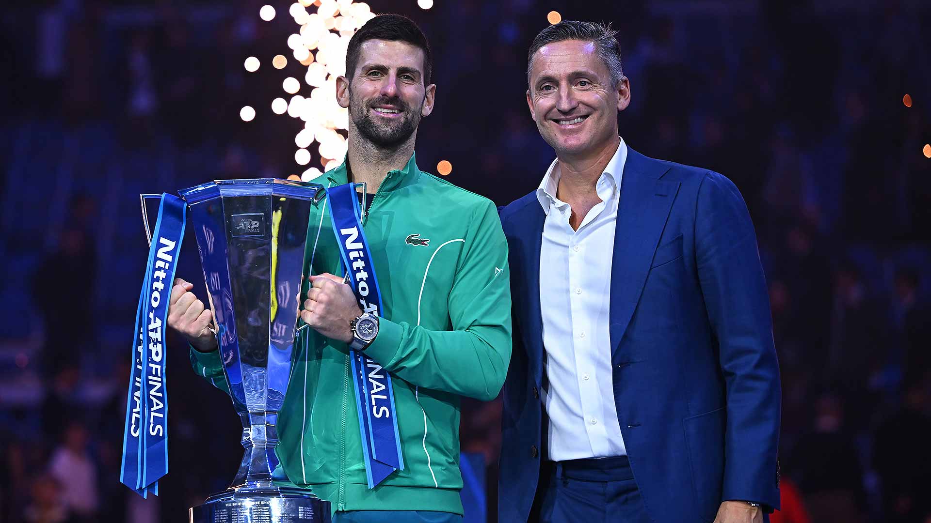 <a href='https://wwwx.atptour.com/en/players/novak-djokovic/d643/overview'>Novak Djokovic</a> celebrates his seventh <a href='https://wwwx.atptour.com/en/tournaments/nitto-atp-finals/605/overview'>Nitto ATP Finals</a> title with ATP Chairman <a href='https://wwwx.atptour.com/en/players/andrea-gaudenzi/g254/overview'>Andrea Gaudenzi</a>.