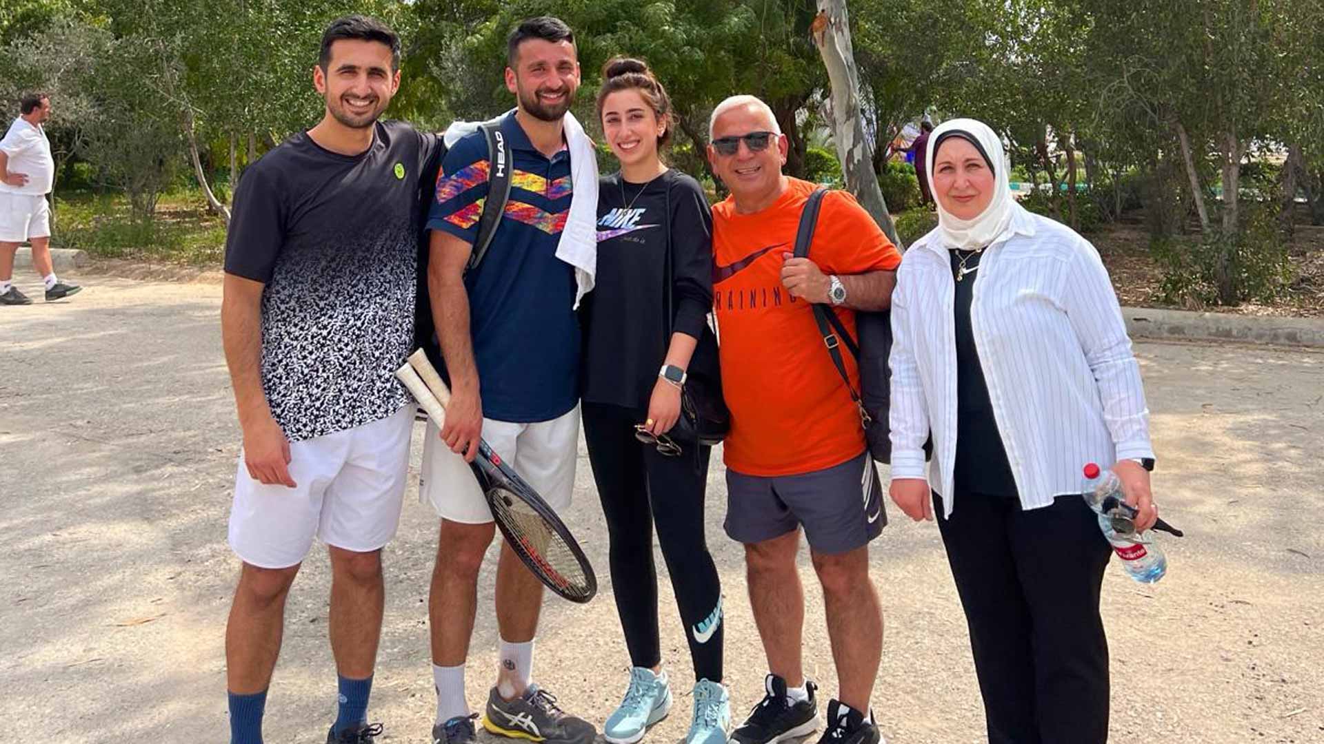 <a href='https://wwwx.atptour.com/en/players/hazem-naw/n0bk/overview'>Hazem Naw</a> and family at the ITF M15 in Kish Island last month.