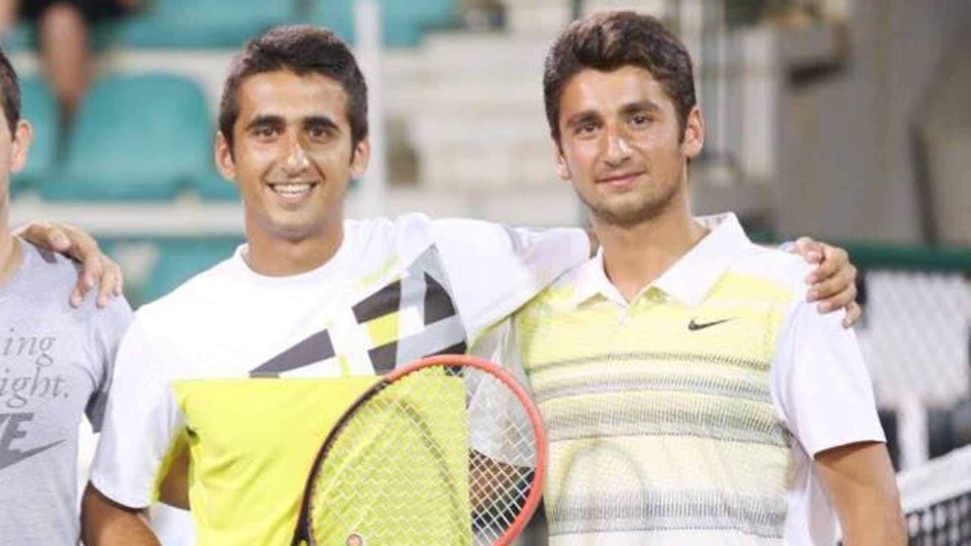 Amer (left) and <a href='https://wwwx.atptour.com/en/players/hazem-naw/n0bk/overview'>Hazem Naw</a> play doubles in Beirut, Lebanon.