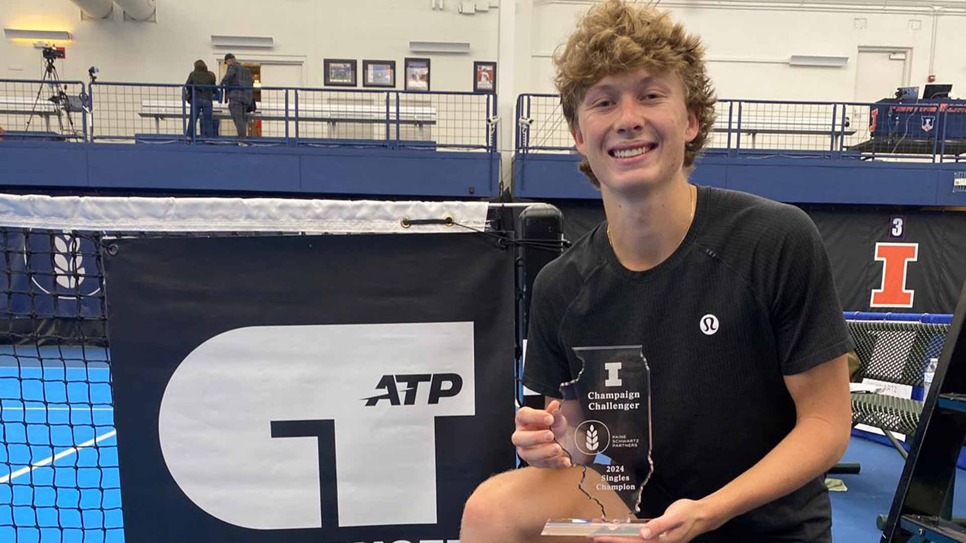 <a href='https://wwwx.atptour.com/en/players/ethan-quinn/q02l/overview'>Ethan Quinn</a> is crowned champion at the ATP Challenger Tour 75 event in Champaign, Illinois.